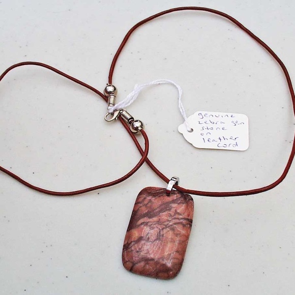 ZEBRA STONE ON LEATHER CORD, BROWNS, 26 INCHES LONG, PUFF FRONT, FLAT BACK, TAG - Picture 2 of 2